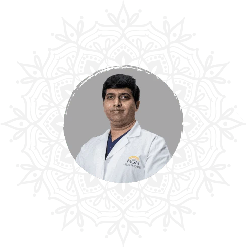 Dr. Anand M