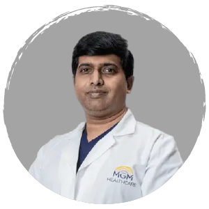 Dr Anand M